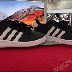 Boys Adidas sneakers.